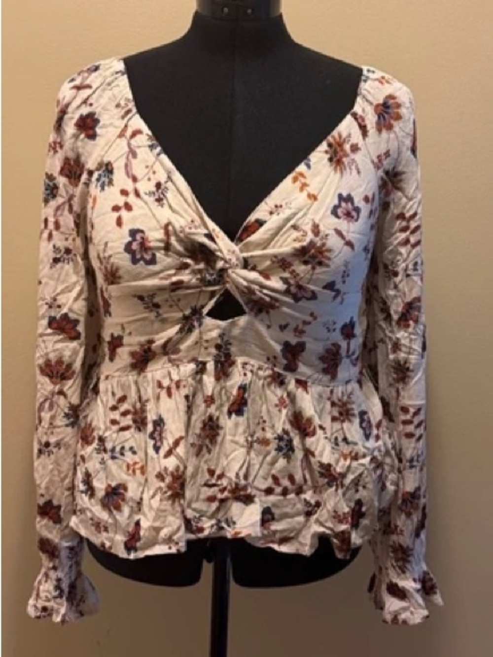 Alya Cream Floral Twist-Front Peplum Blouse